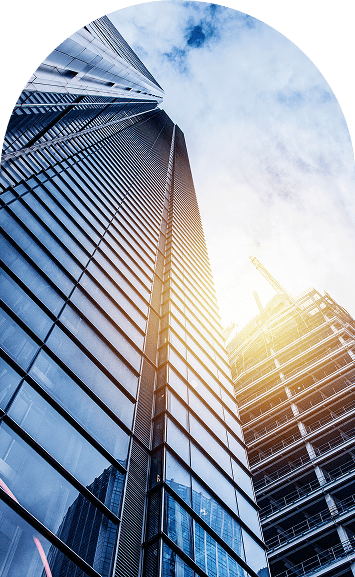 Upward view of glass skyscrapers with sunlight