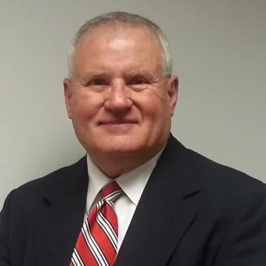 Smiling man in suit and striped tie